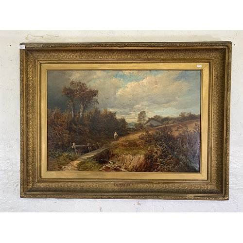 301 - A 19th century gilt framed Clarence Roe (1850-1909) oil on canvas of a landscape scene - approx. 92c... 