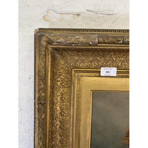 301 - A 19th century gilt framed Clarence Roe (1850-1909) oil on canvas of a landscape scene - approx. 92c... 