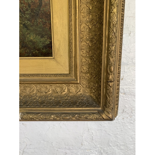 301 - A 19th century gilt framed Clarence Roe (1850-1909) oil on canvas of a landscape scene - approx. 92c... 