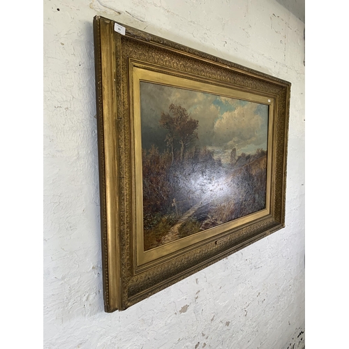 301 - A 19th century gilt framed Clarence Roe (1850-1909) oil on canvas of a landscape scene - approx. 92c... 