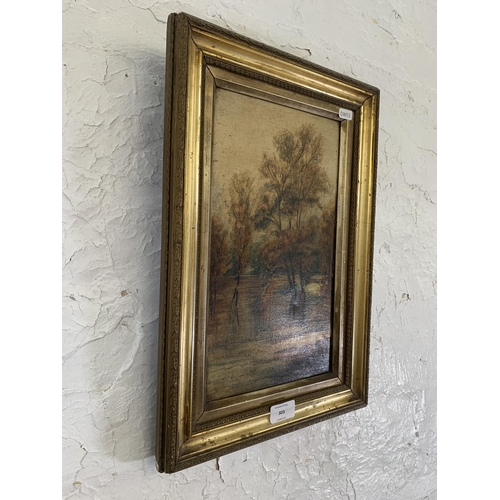 303 - A 19th century gilt framed oil on canvas of landscape scene - approx. 46cm high x 30cm wide