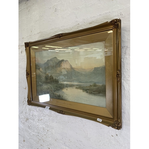 304 - A gilt framed Alfred de Breanski (1852-1928) 'A Highland Sunset Kilchurn Castle' print - approx. 50c... 