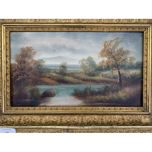 305 - A late 19th/early 20 century gilt framed oil on board of a  landscape scene - approx. 33cm high x 48... 