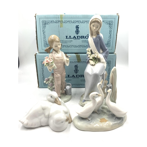 324 - Four Lladro porcelain figurines, two boxed and two Nao by Lladro