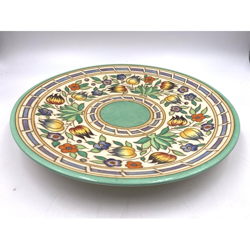 326 - A Charlotte Rhead Bursley Ware TL14 wall charger - approx. 30cm diameter