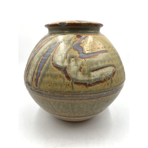 330 - A mid 20th century studio pottery vase with impressed maker's mark 'DG' - approx. 20cm high