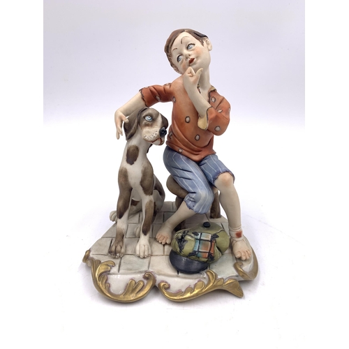 340 - Three Capodimonte porcelain figurines, English setter, Postman and Boy & Dog