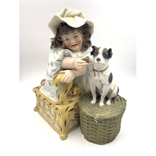 340A - A German Bisque Porcelain figurine of girl feeding dog - approx. 30cm high