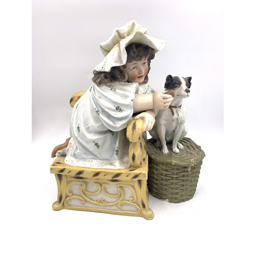 340A - A German Bisque Porcelain figurine of girl feeding dog - approx. 30cm high