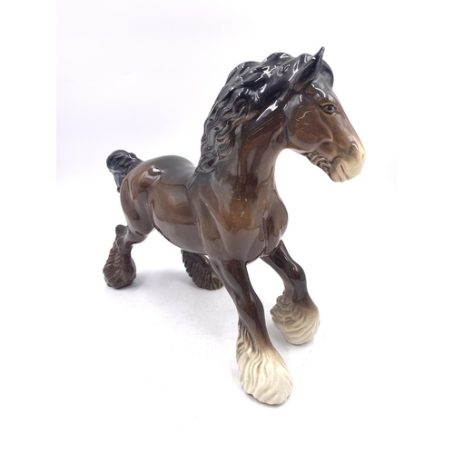 358 - A Beswick brown gloss Shire horse figurine, model no. 975 - approx. 21cm high