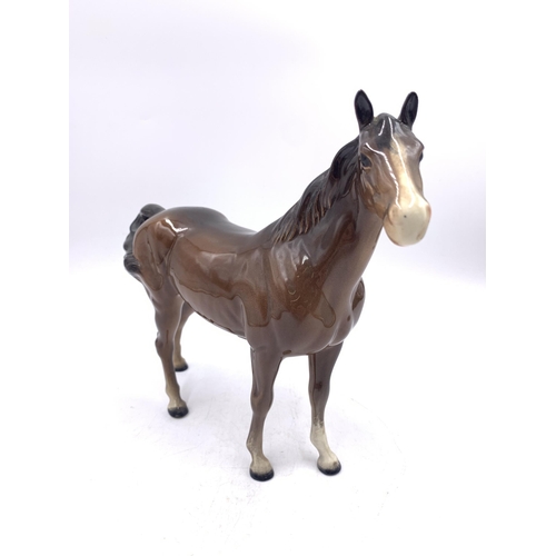 359 - A Beswick brown gloss horse figurine - approx. 21cm high