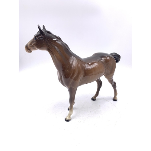 359 - A Beswick brown gloss horse figurine - approx. 21cm high