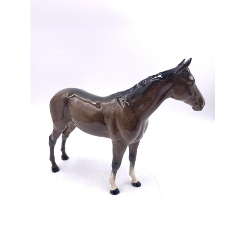 360 - A Beswick brown gloss horse figurine - approx. 20cm high