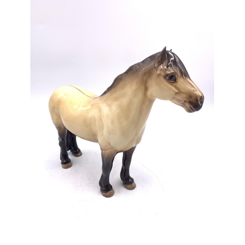 361 - A Beswick Highland pony figurine - approx. 18cm high