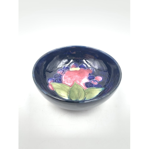 376 - A Moorcroft Pomegranate circular footed bowl - approx. 8cm diameter