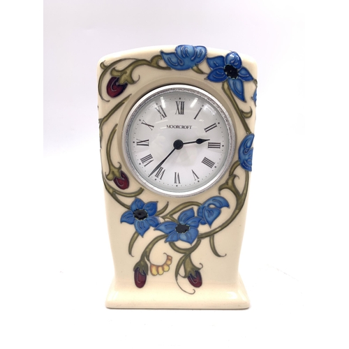 386 - A Moorcroft True Blue mantel clock - approx. 16cm high