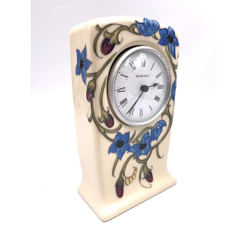 386 - A Moorcroft True Blue mantel clock - approx. 16cm high