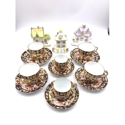 390 - Nine ceramic items, six Royal Crown Derby Traditional Imari 2451 cups and saucers and three Coalport... 