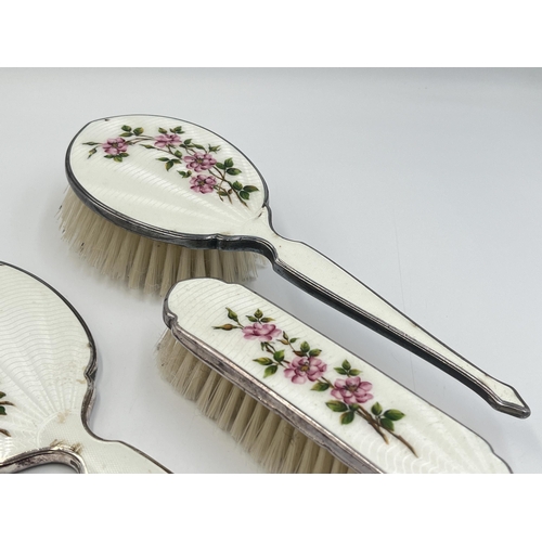 2203 - A mid 20th century Art Deco style HCD white metal and enamel three piece dressing table set comprisi... 