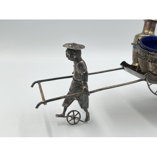 2205 - A vintage boxed Chinese 0.900 silver cruet set stamped WK, with porter and rickshaw - approx. gross ... 