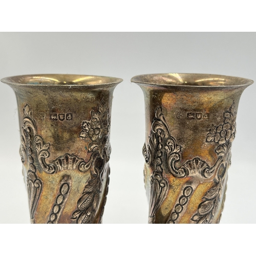 2208 - A pair of Victorian hallmarked London solid silver embossed vases, dated 1899 - approx. gross weight... 