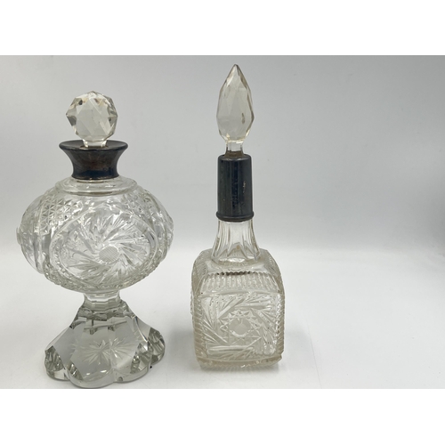 2210 - Four antique hallmarked silver and cut glass perfume bottles to include Birmingham 1908, Chester 190... 