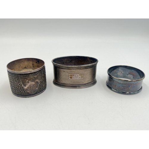 2219 - Three hallmarked silver napkin rings, two Birmingham 1936 and one Sheffield 1899 - approx. gross wei... 