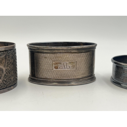 2219 - Three hallmarked silver napkin rings, two Birmingham 1936 and one Sheffield 1899 - approx. gross wei... 