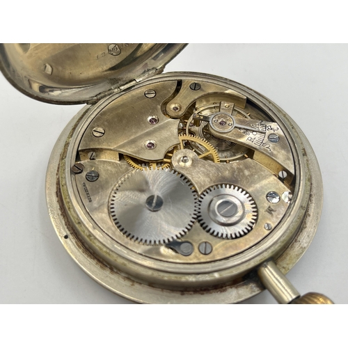 2221 - A 1930s Finnigan's Goliath 8 day pocket watch with Swiss movement and turned teak stand