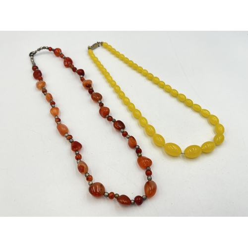 2241 - Two vintage beaded necklaces, one carnelian agate and one believed amber