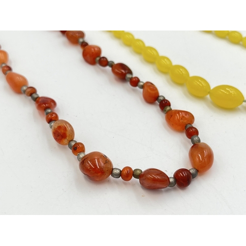 2241 - Two vintage beaded necklaces, one carnelian agate and one believed amber