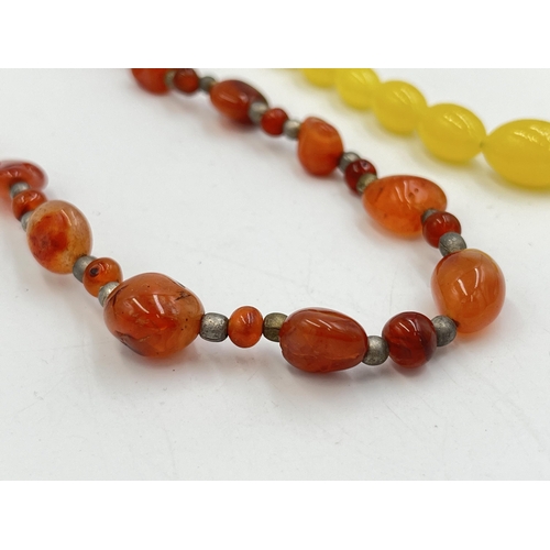 2241 - Two vintage beaded necklaces, one carnelian agate and one believed amber