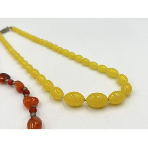 2241 - Two vintage beaded necklaces, one carnelian agate and one believed amber