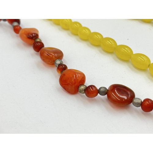 2241 - Two vintage beaded necklaces, one carnelian agate and one believed amber