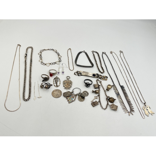 2242 - A collection of hallmarked and stamped silver jewellery to include charm bracelet, two ID bracelets,... 