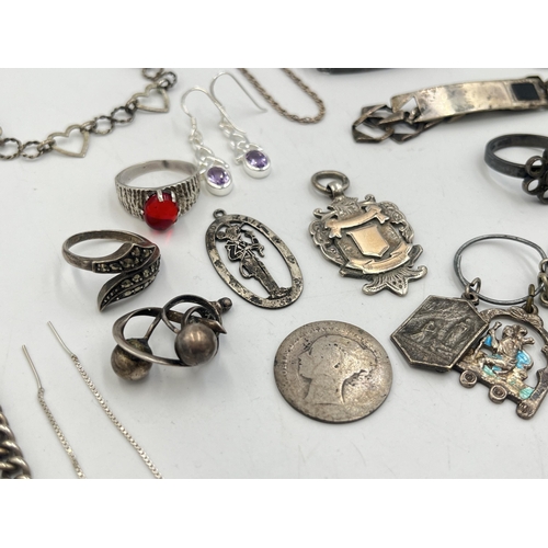 2242 - A collection of hallmarked and stamped silver jewellery to include charm bracelet, two ID bracelets,... 