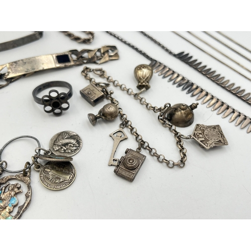 2242 - A collection of hallmarked and stamped silver jewellery to include charm bracelet, two ID bracelets,... 