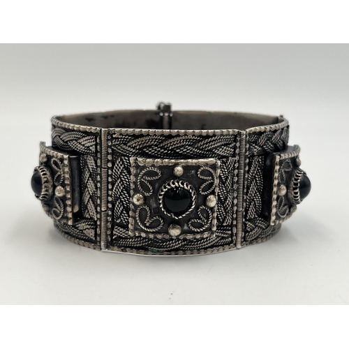 2244 - An Egyptian silver and black onyx panel bracelet - approx. gross weight 64g and approx. 17cm long