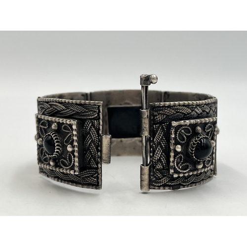 2244 - An Egyptian silver and black onyx panel bracelet - approx. gross weight 64g and approx. 17cm long