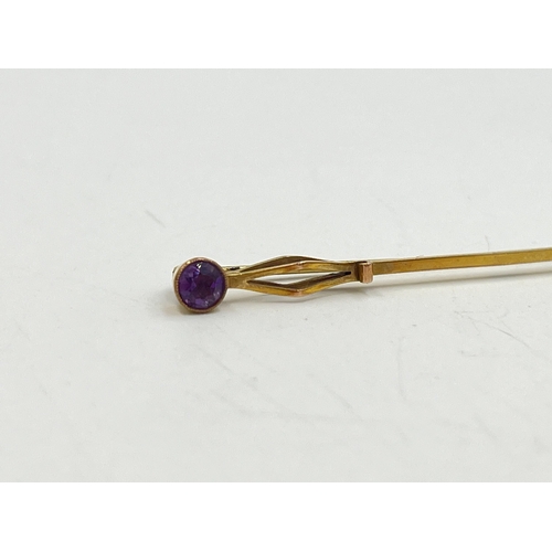 2245 - A 9ct gold amethyst set pin brooch with metal pin - approx. gross weight 1.5g