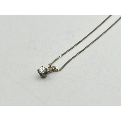 2249 - A 14ct white plumb gold diamond pendant necklace - approx. gross weight 2.45g