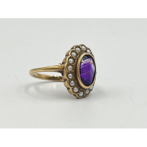 2251 - A hallmarked 9ct gold amethyst and seed pearl halo ring, size O - approx. gross weight 4.3g