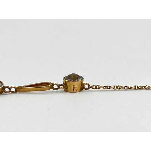 2253 - An early 20th century 9ct gold aquamarine set pendant necklace - approx. gross weight 2.9g