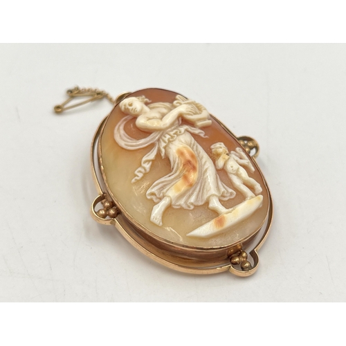 2254 - A 19th century rose metal framed carved shell cameo brooch - approx. gross weight 14.6g and 5.5cm x ... 