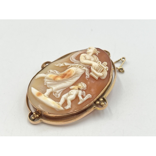 2254 - A 19th century rose metal framed carved shell cameo brooch - approx. gross weight 14.6g and 5.5cm x ... 