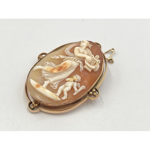 2254 - A 19th century rose metal framed carved shell cameo brooch - approx. gross weight 14.6g and 5.5cm x ... 