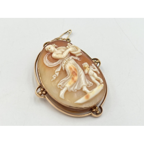 2254 - A 19th century rose metal framed carved shell cameo brooch - approx. gross weight 14.6g and 5.5cm x ... 