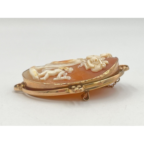 2254 - A 19th century rose metal framed carved shell cameo brooch - approx. gross weight 14.6g and 5.5cm x ... 