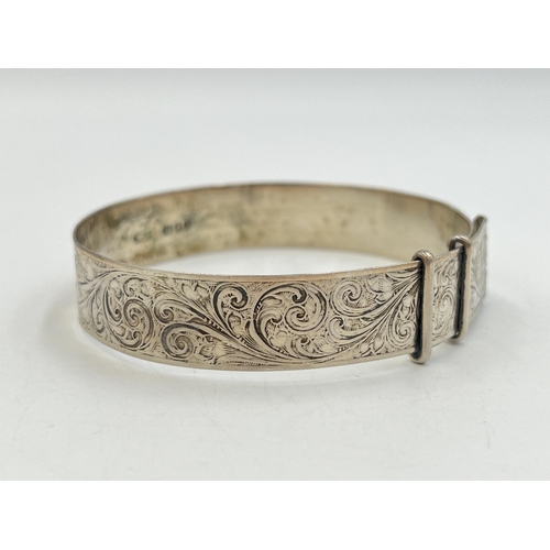 2256 - A hallmarked London silver foliate etched buckle bangle, dated 1963 - approx. gross weight 14.7g