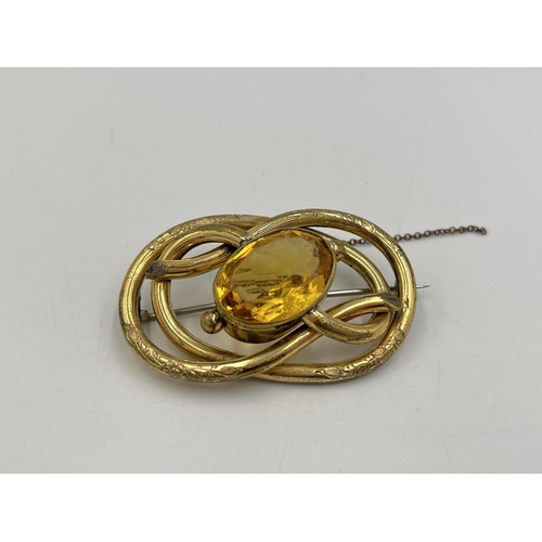 2277 - An antique yellow metal citrine set brooch with base metal pin - approx. gross weight 22g and 3.5cm ... 